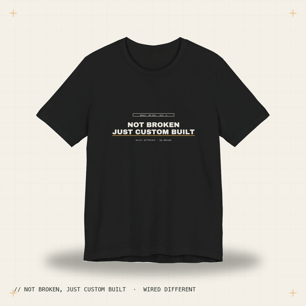 not broken, just custom built — black tee, Wired Different